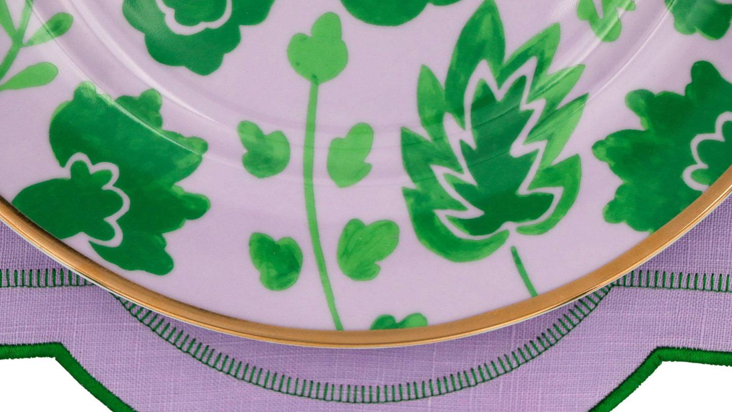 Bernadette Leaf Dinner Plate with green botanical pattern and gold rim on lavender tablecloth