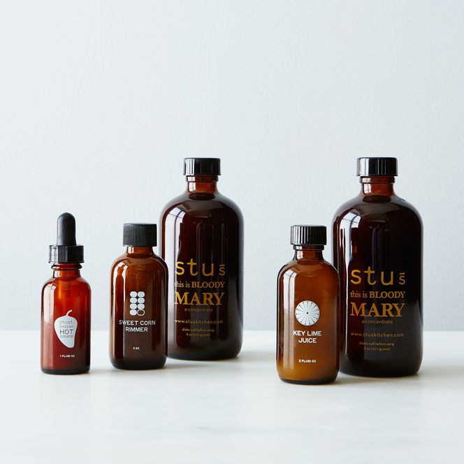 Stu's Bloody Mary Mixology Kit: a lineup of brown bottles for a Bloody Mary bar.