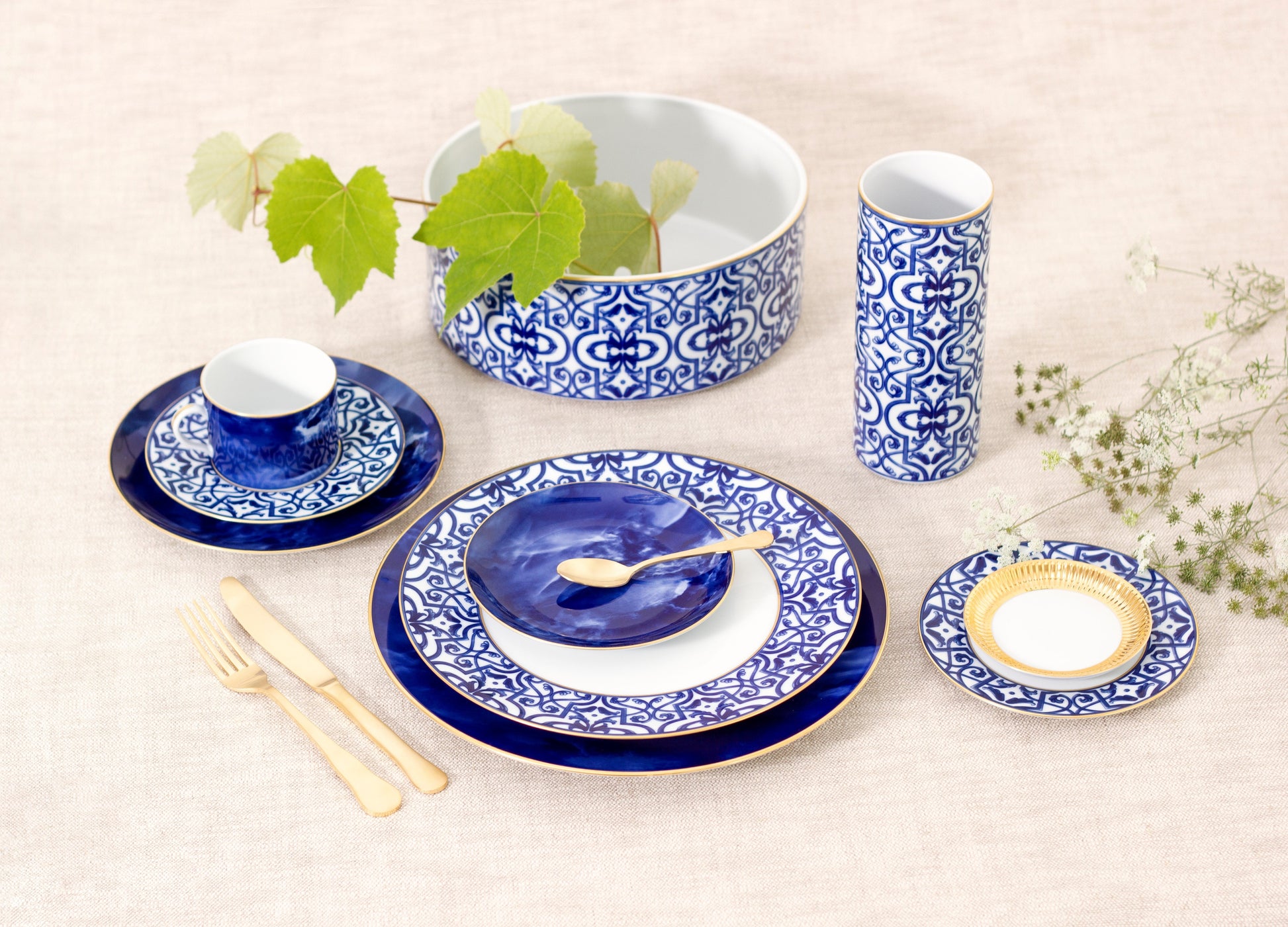 Blue Legacy Dinner Plate set (4) in azulejos-inspired blue and white ceramic with gold rims.