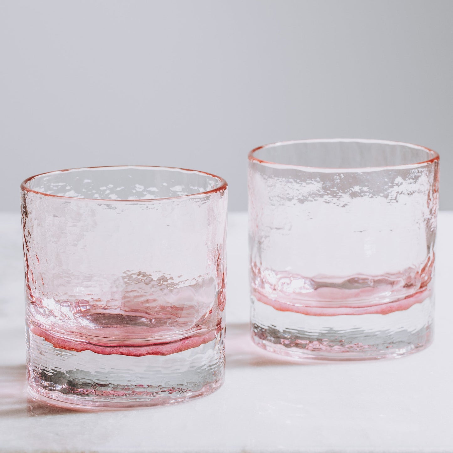 Cherry Blossom Collection pink hand-blown rocks glasses, set of 2, textured with pink base.