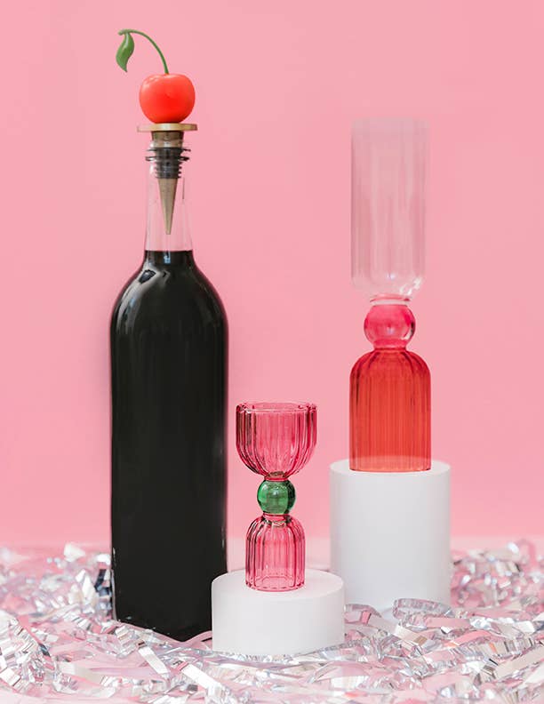Tipsy Turvy Bar Glass Set: two decorative stemware pieces on pedestals, mimosa-ready display for your bar cart.
