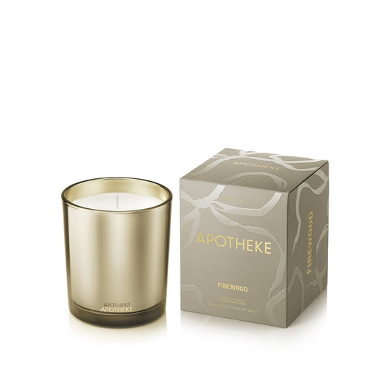 Firewood Classic Candle in gilded brown glass with gold interior; premium soy wax blend, warm bonfire aroma.