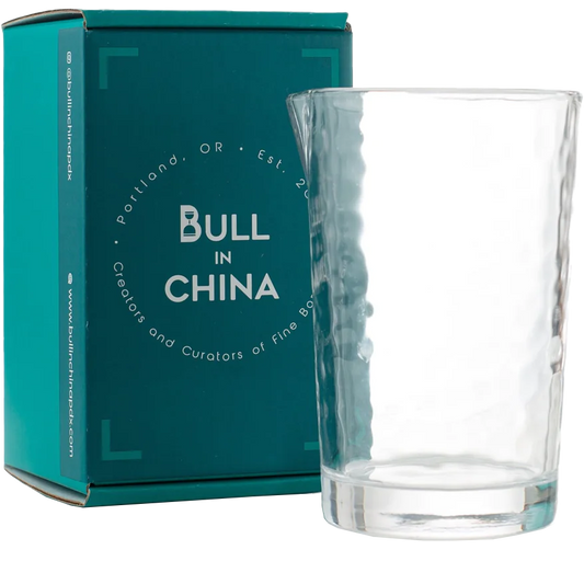 BULL IN CHINA The Flagship annealed mixing glass beside teal box; durable, dishwasher-safe, heat-tolerant.