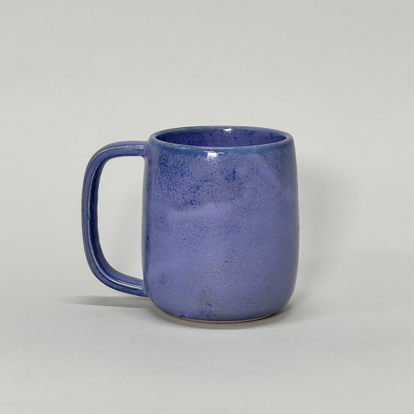 The Standard Mug - blue glazed ceramic mug, 12oz capacity, comfortable handle.