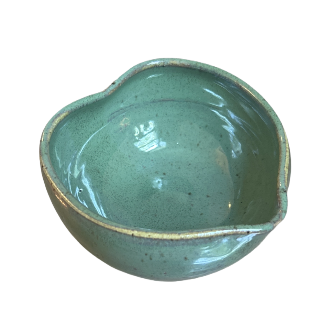 Heart-shaped matcha bowl with turquoise glaze, handcrafted in NYC in collaboration with Marina Caspe.