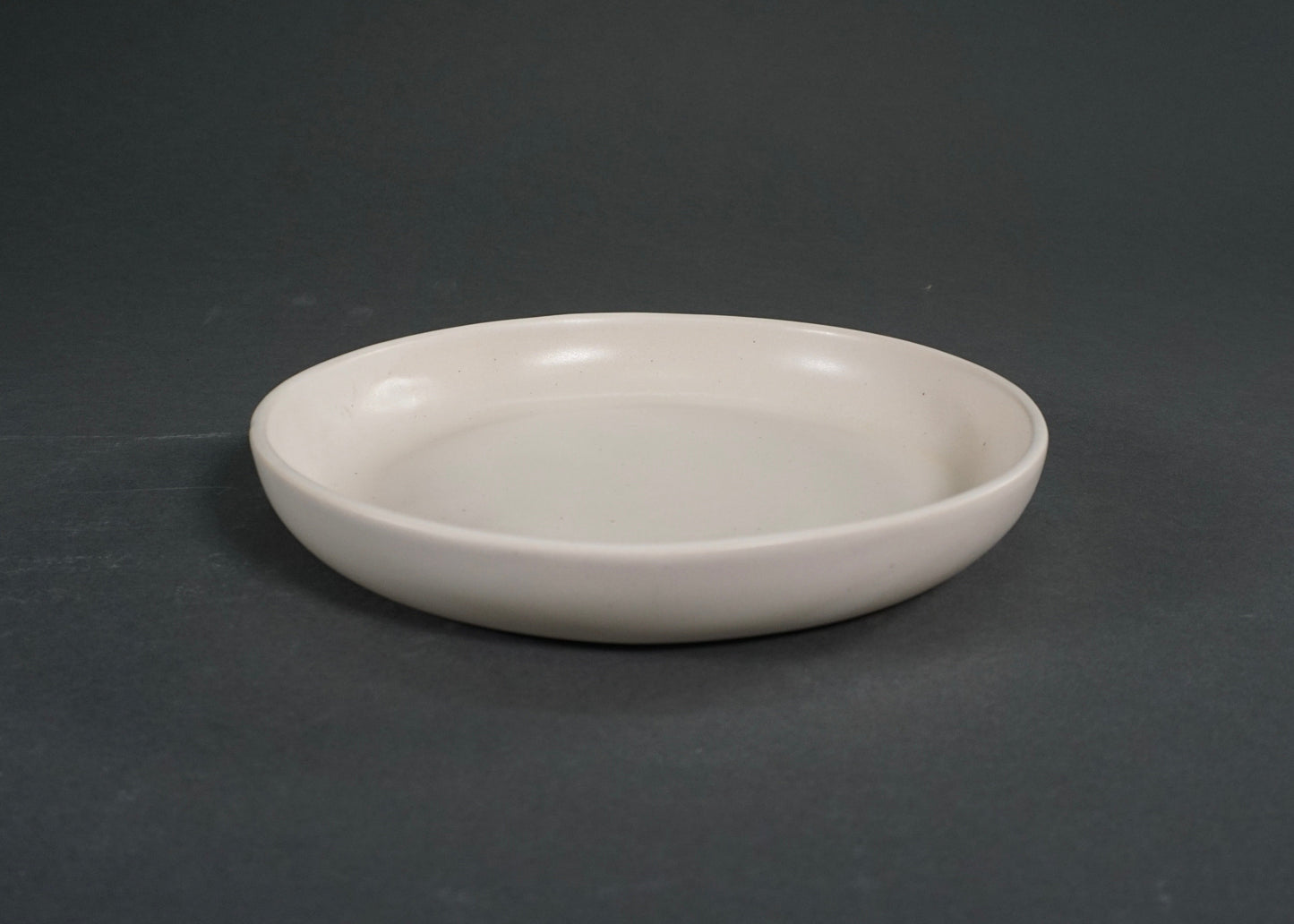 Ivory ceramic dinner plate from The Dinnerware Set - Ivory