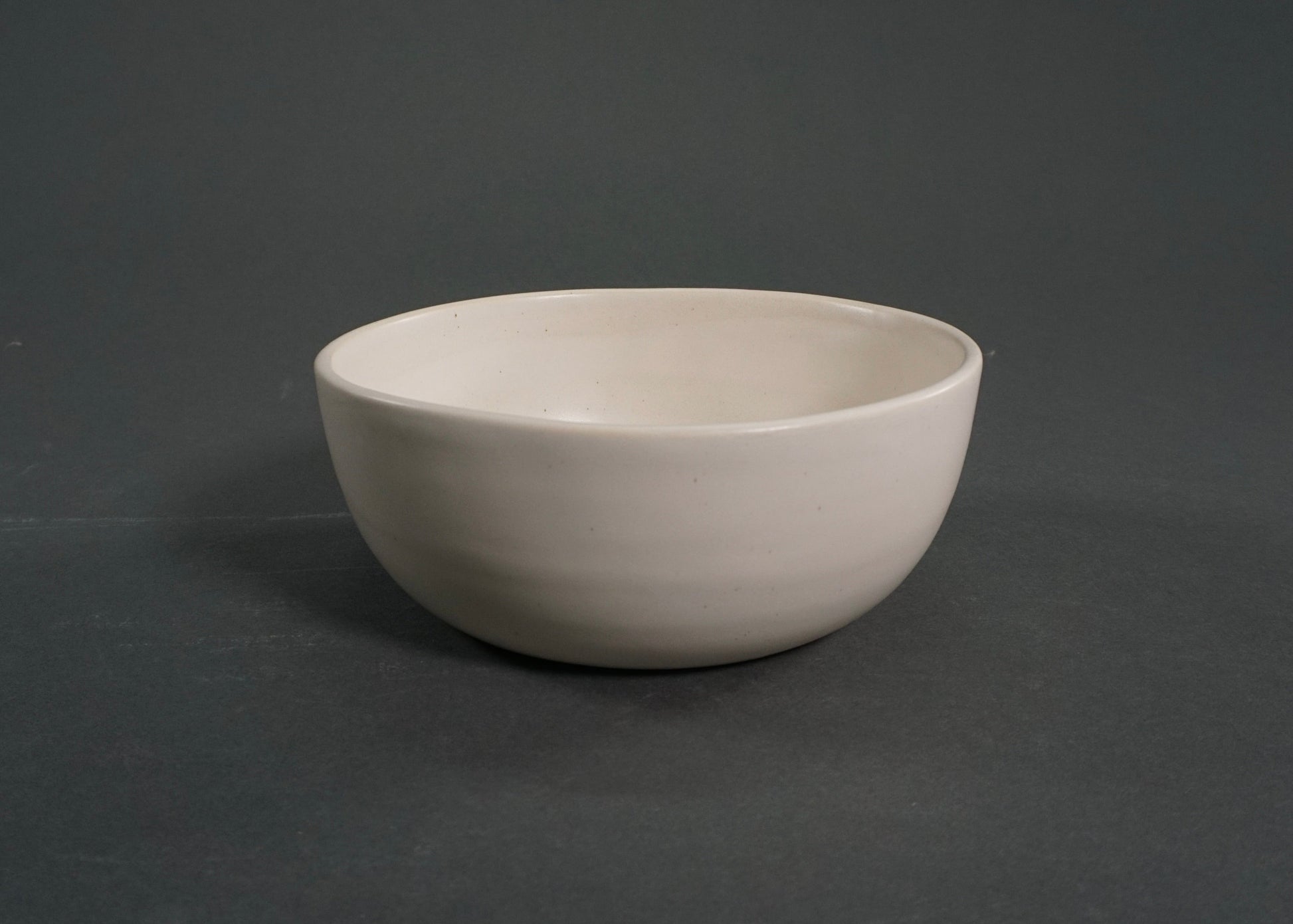 Ivory ceramic bowl, part of The Dinnerware Set - Ivory.