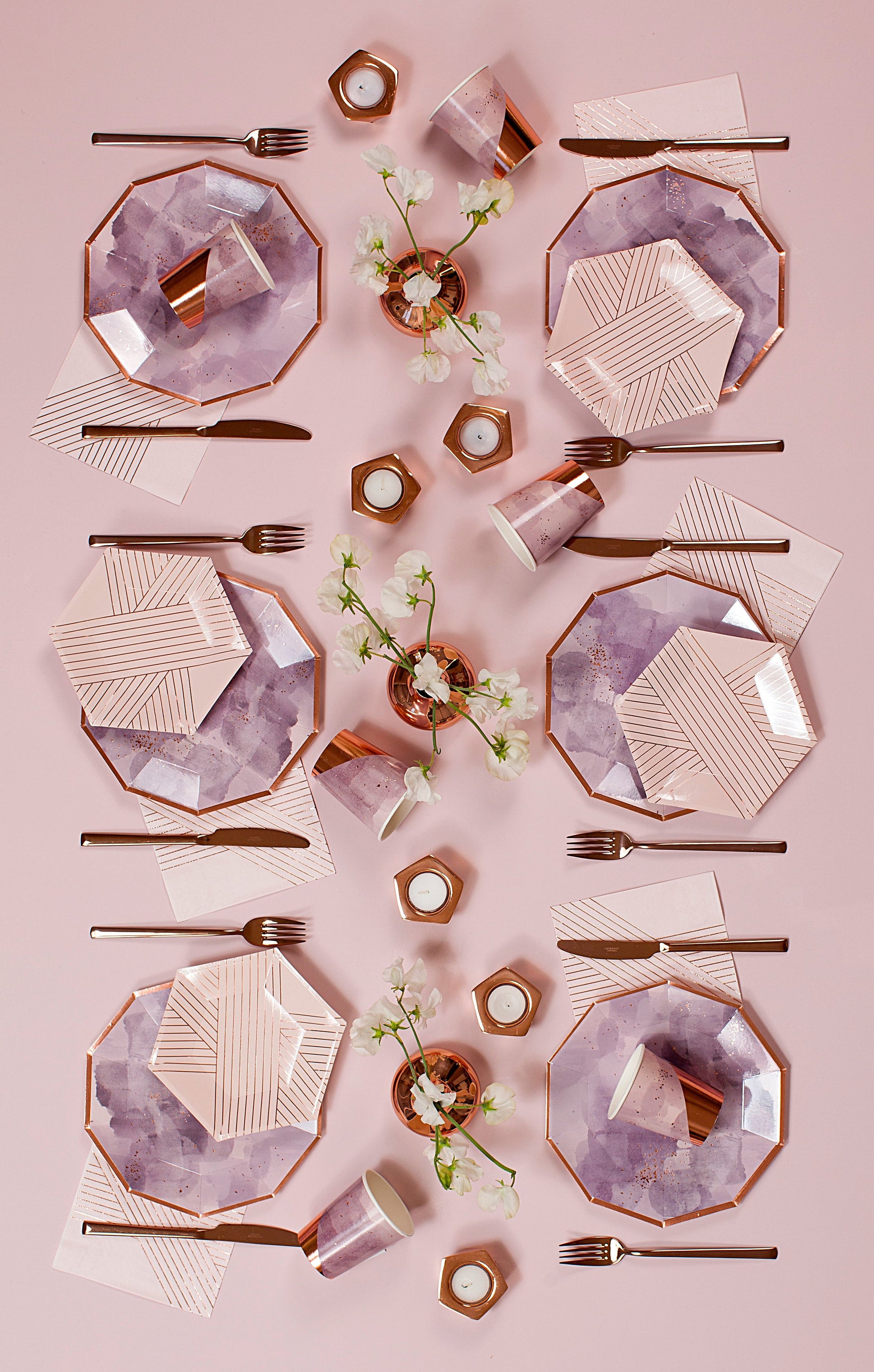 Amethyst light purple watercolor premium large plates with rose gold edges set on pink table with napkins and flowers.