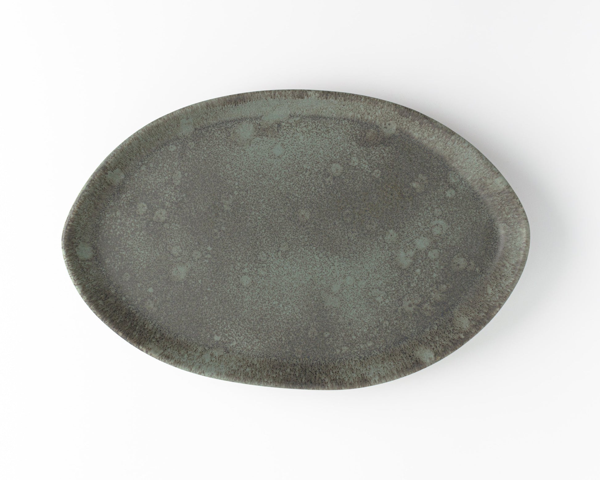 Grey speckled oval platter from a 3-piece serving set in 13-inch, 15-inch, and 18-inch sizes.