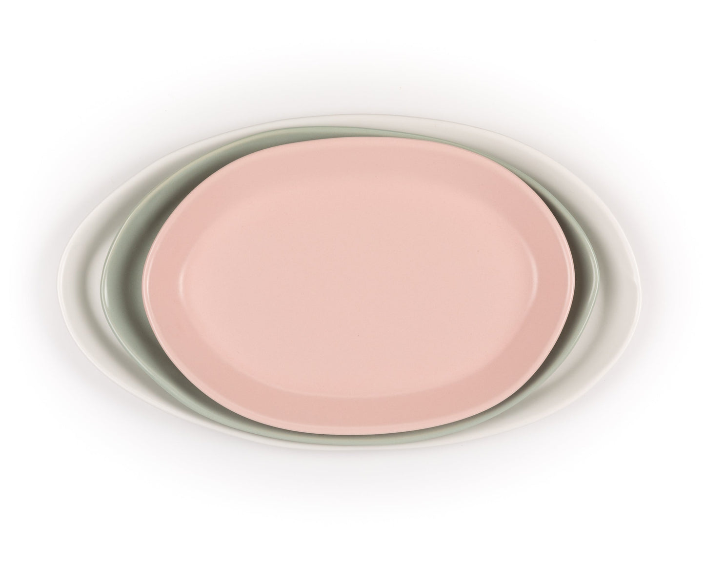Three-piece oval serving platter set in pink, sage green, and white; nested sizes 13, 15, and 18 inches.