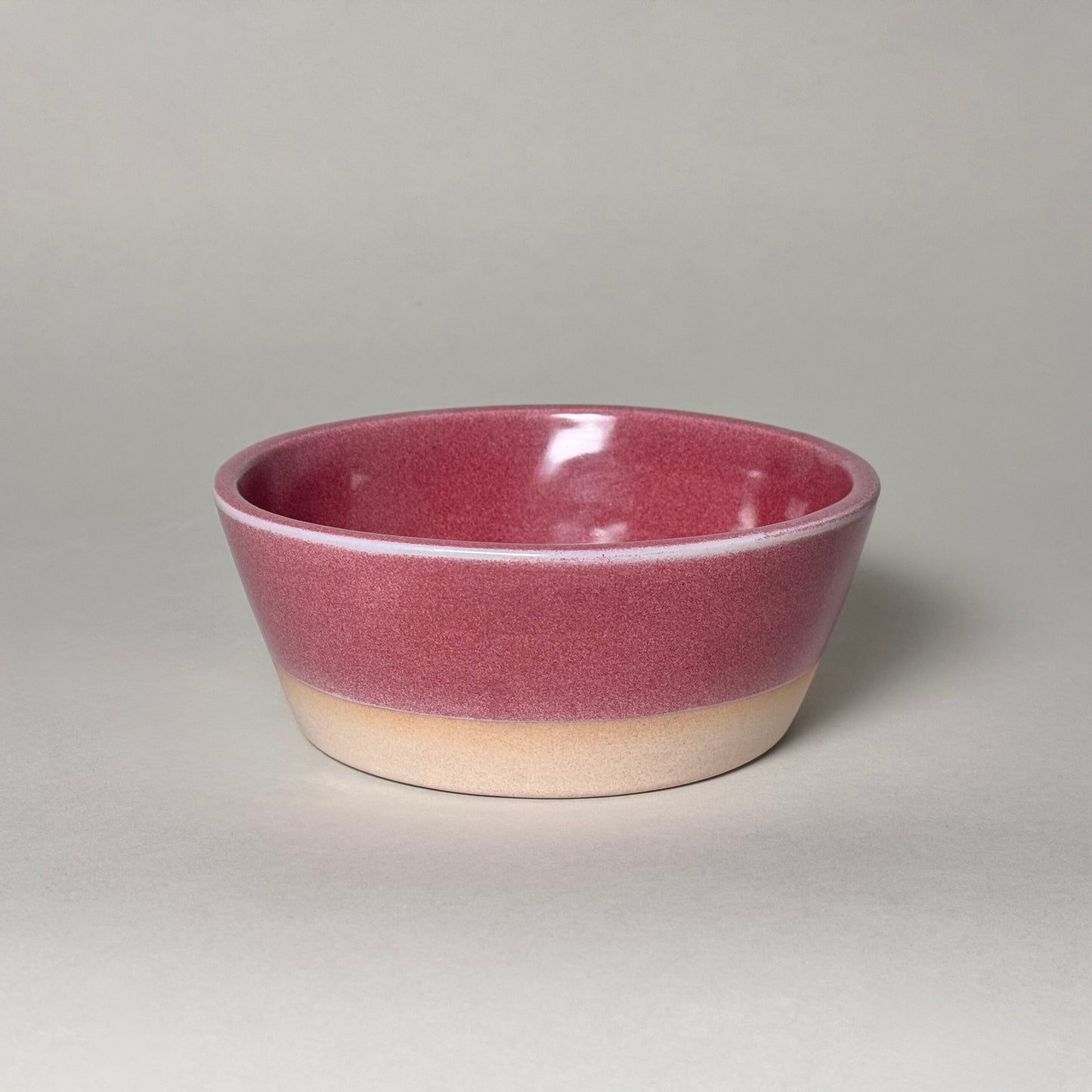6-inch mauve-glazed soup bowl with natural beige foot, ceramic serving dish.