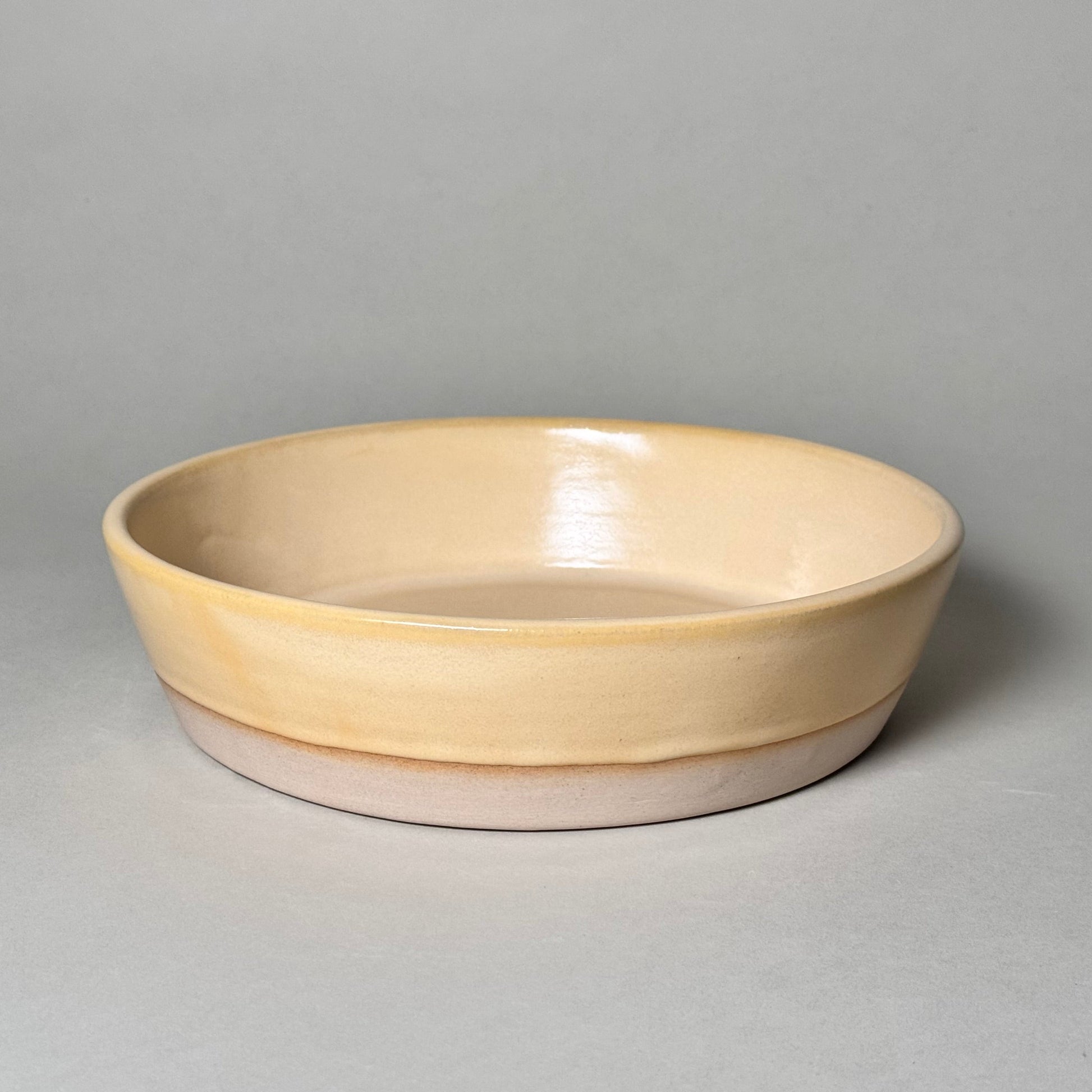 Share Bowl - 9" ceramic bowl with a wide 9.5-inch opening and 2.5-inch depth.