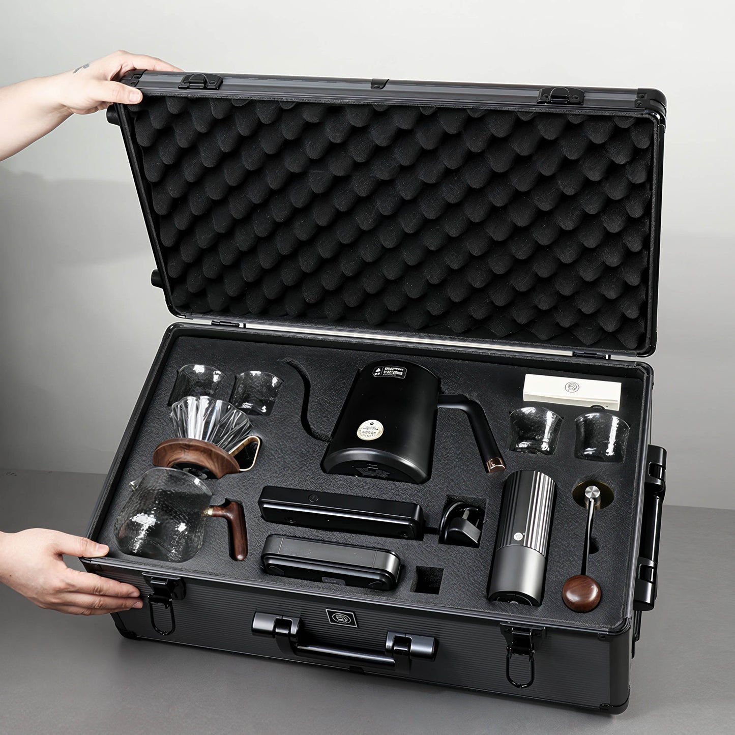 Ultimate Pour Over Coffee Pro Kit stored in a foam-lined hard case with portable brewing gear for travel.