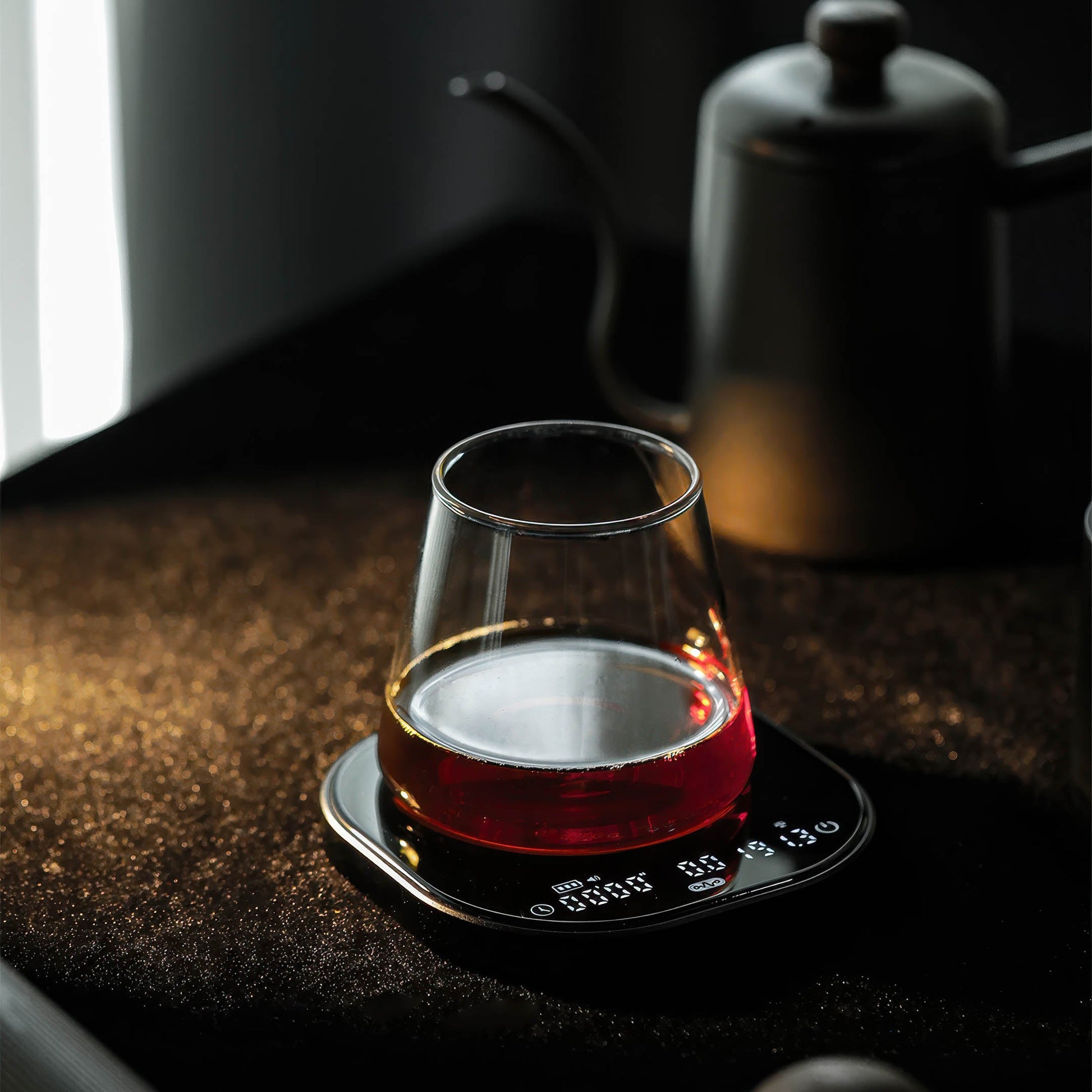 Coffee Plus Data Master Pro Smart Coffee Scale with aluminum unibody and crystal-clear display, glass cup on the scale
