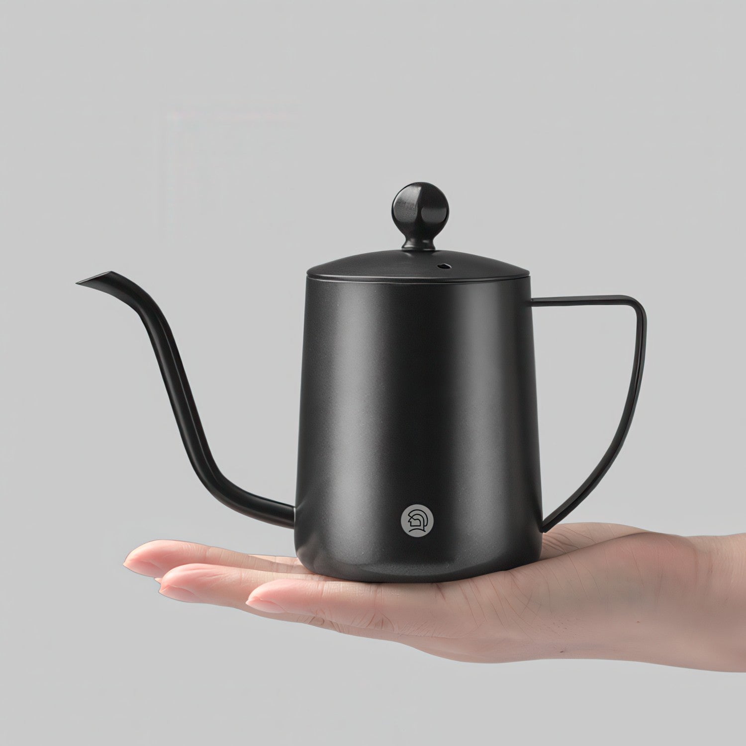 Gooseneck Pour Over Coffee Kettle in black 304 stainless steel with precision spout, held in hand.