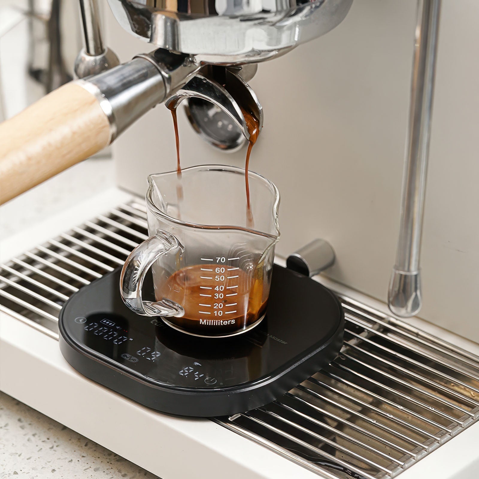 Coffee Plus Data Master Pro Smart Coffee Scale measuring espresso with aluminum unibody and crystal display