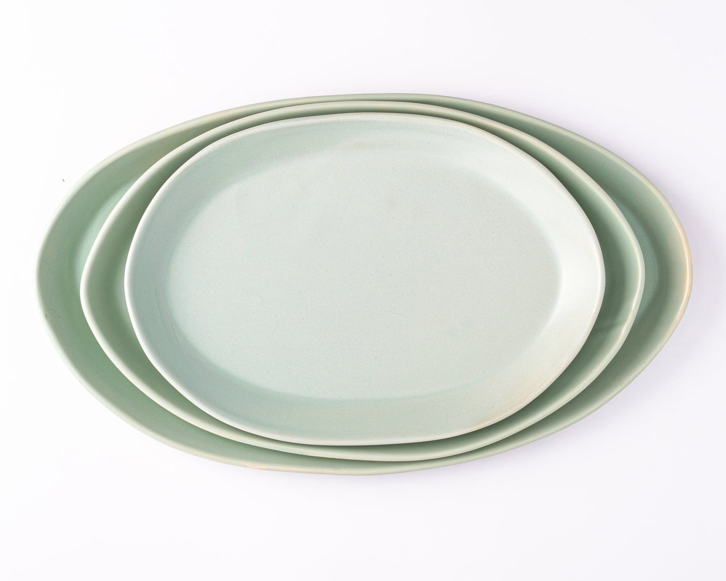 3 Piece Serving Platter Set: three oval mint-green platters in 13, 15, and 18 inches, stacked.