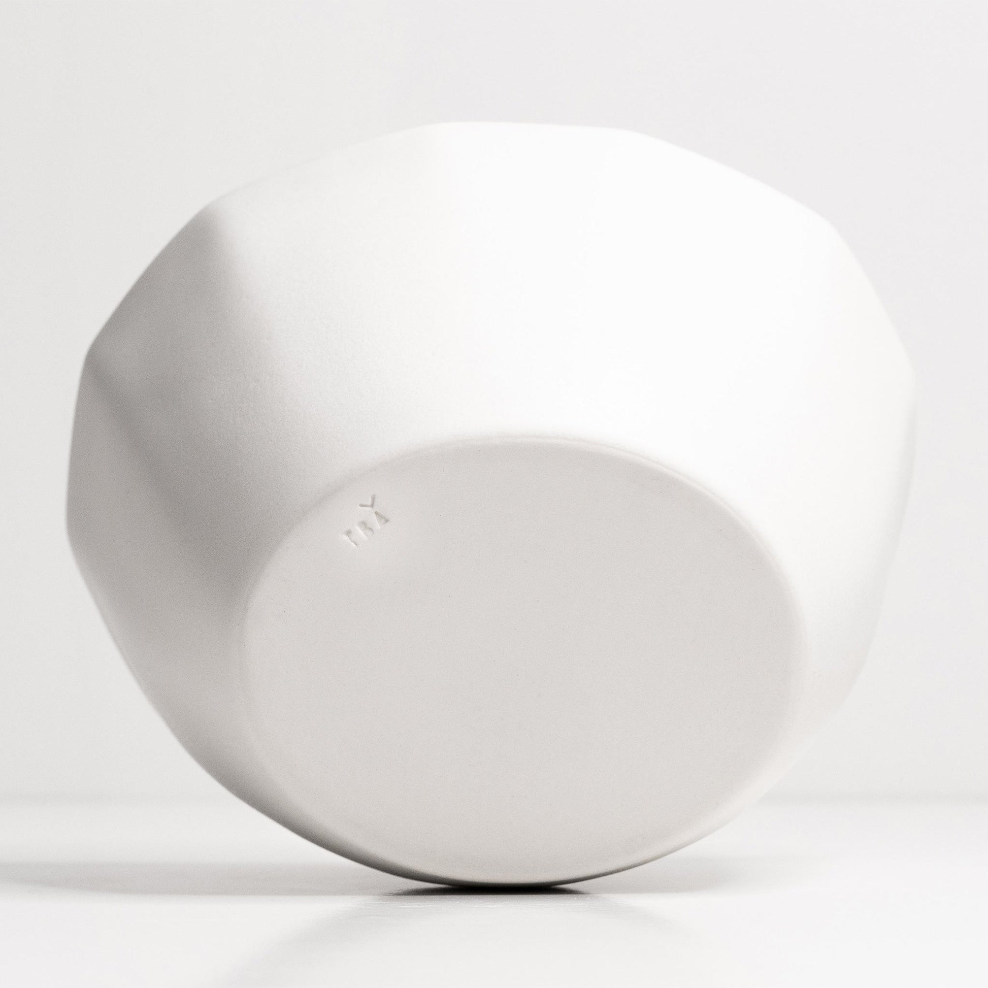 Large white porcelain nesting bowl, handmade by Ember Collective; ideal for pasta and salads.