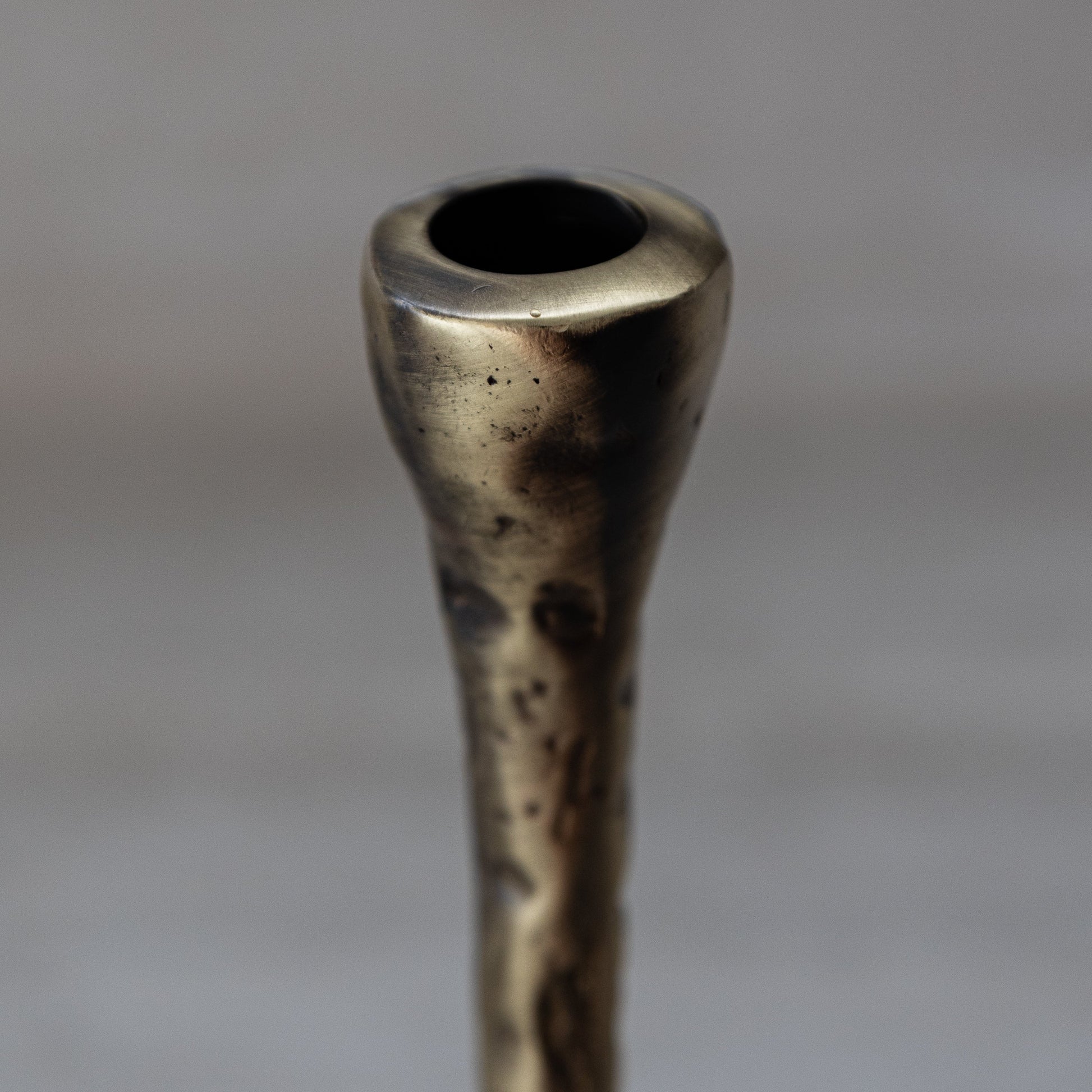 Close-up of antique brass candlestick top, hand-forged brass from northern Greece with Byzantine-inspired style