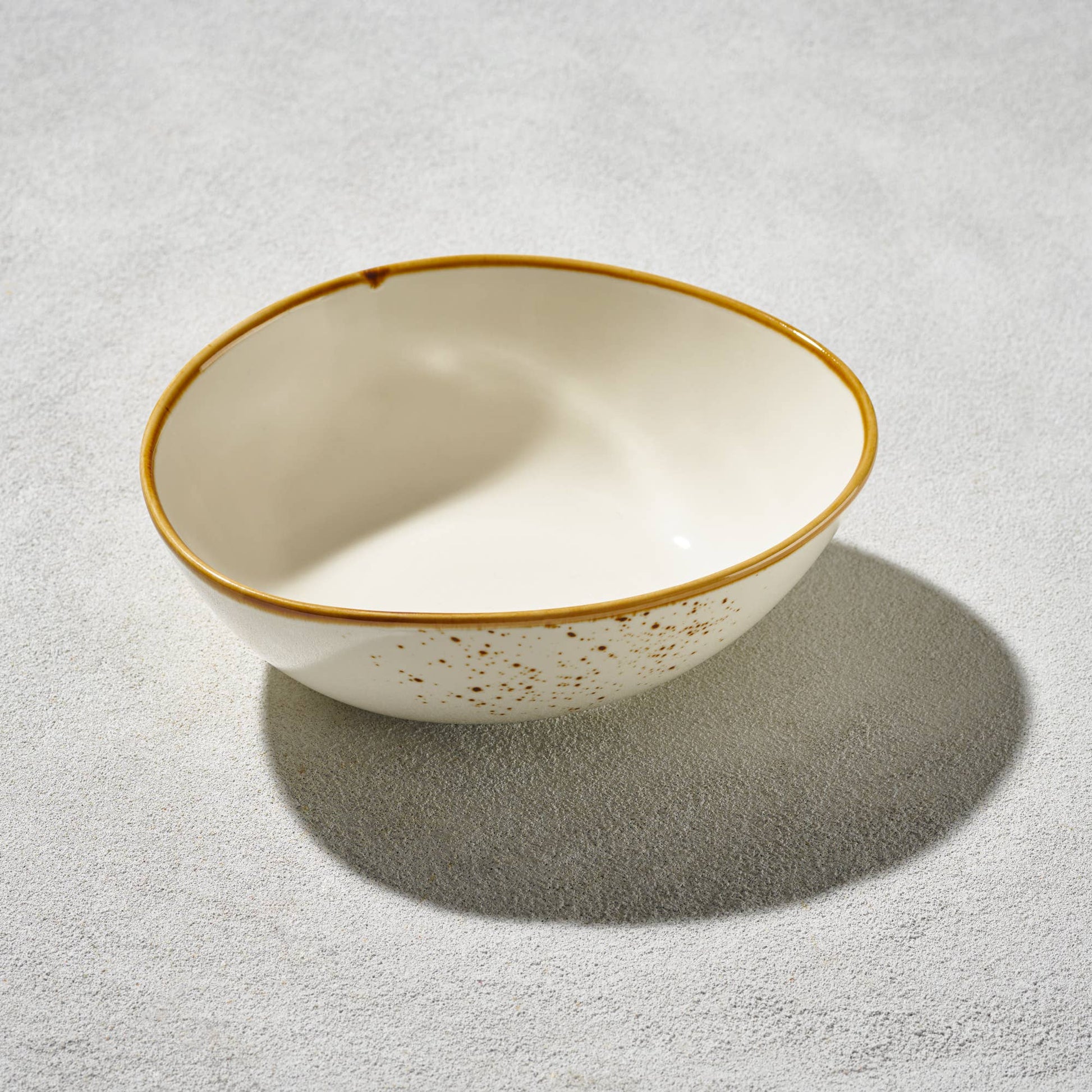 Terra Oval Bowl, White, 8.5 in ceramic oval bowl with gold rim and speckled brown exterior