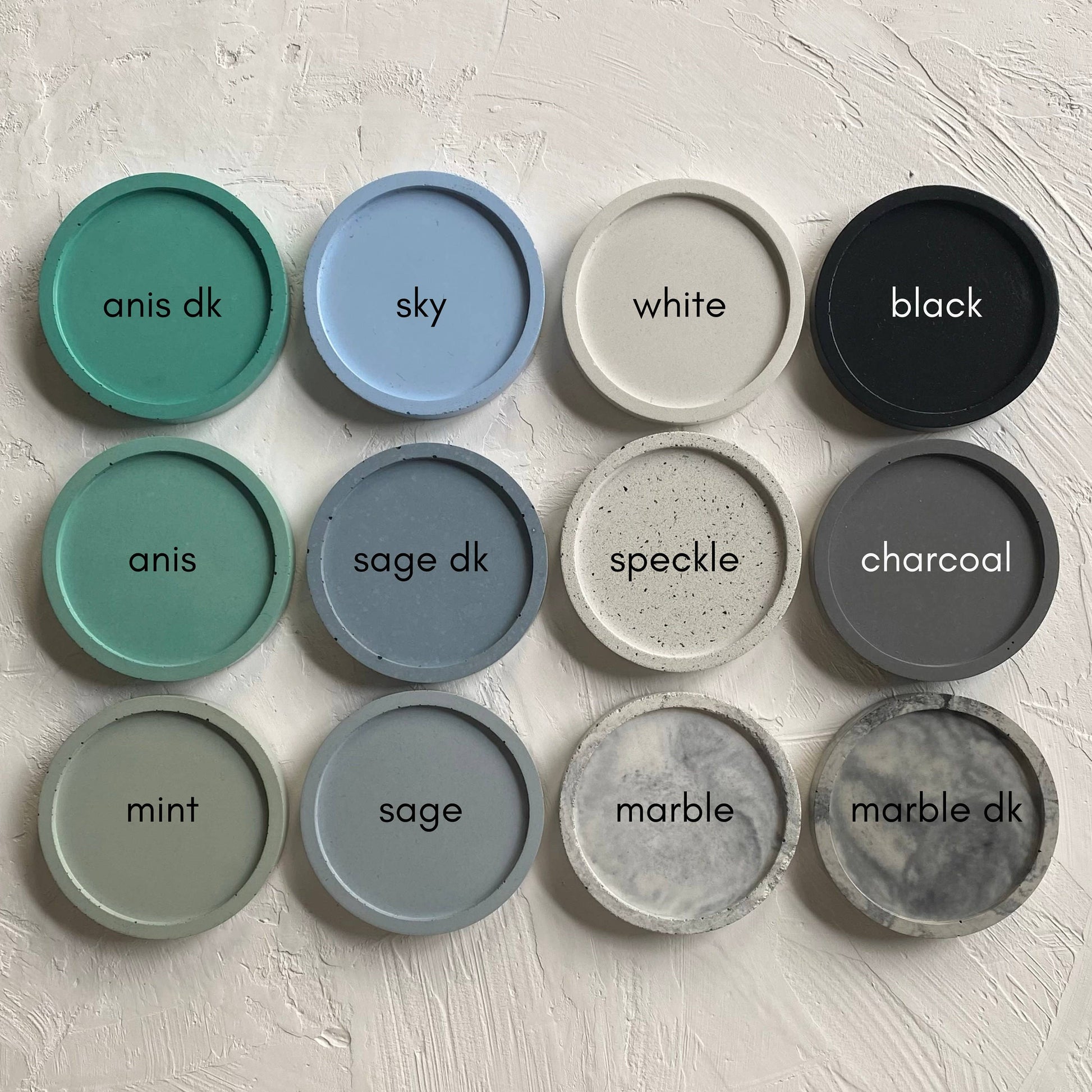 Color swatches for FORMA handmade concrete bowls in diverse hues, including black, sage dk, sky, white, marble, mint.