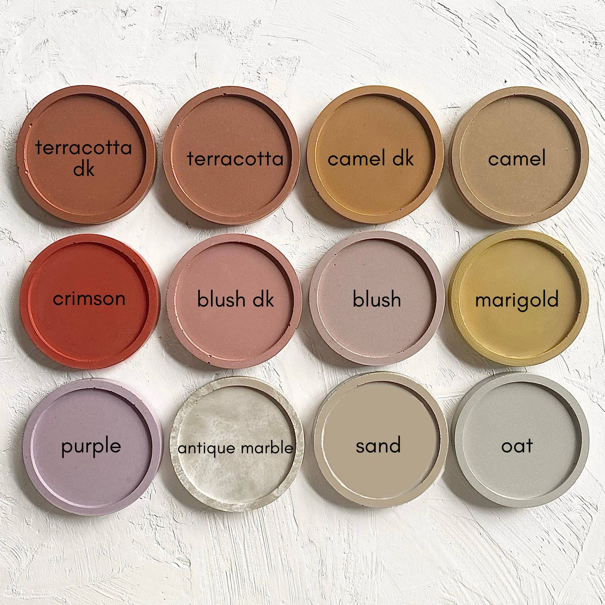 Color swatches for FORMA handmade concrete bowl in 8 shades: terracotta, camel, crimson, blush, marigold, sand, oat.