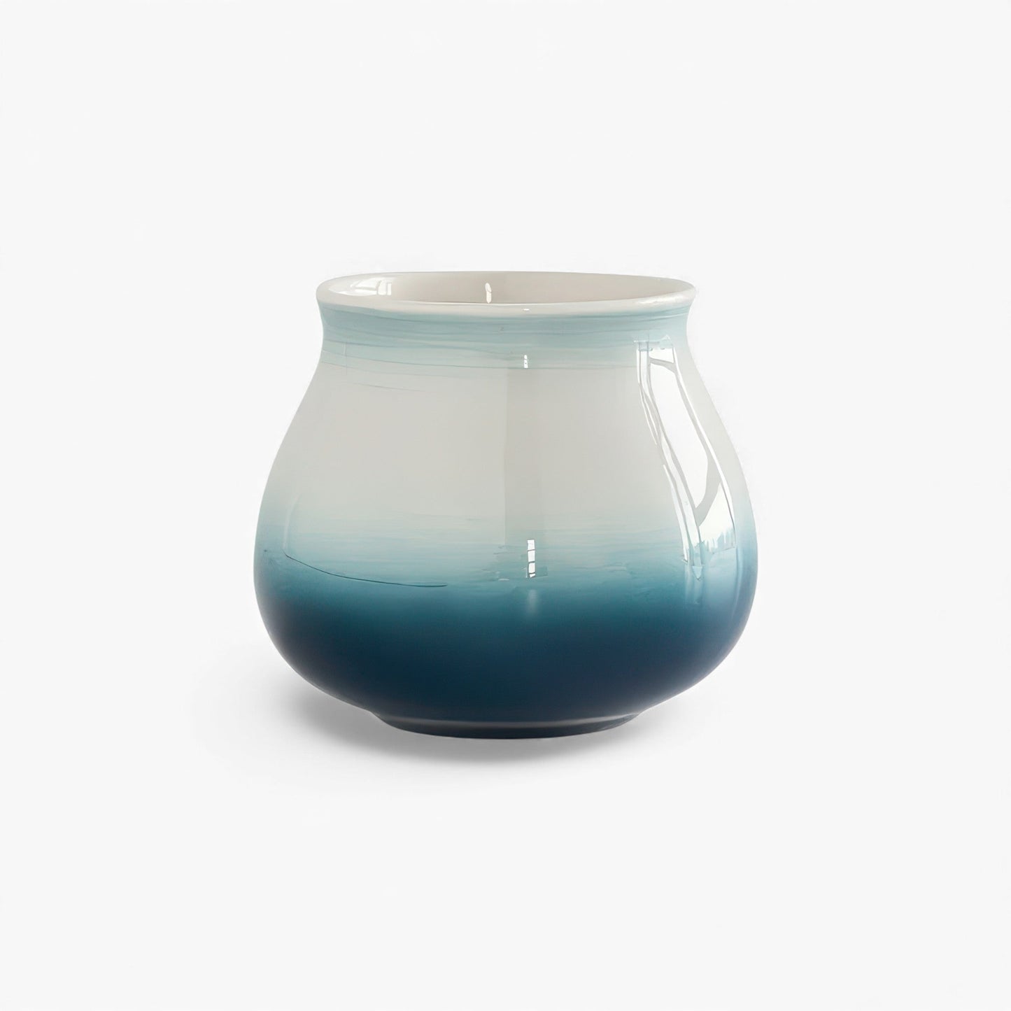 Ceramic gradient coffee cup with blue-to-navy ombre, wide mouth and hemispherical bottom, 180ml.