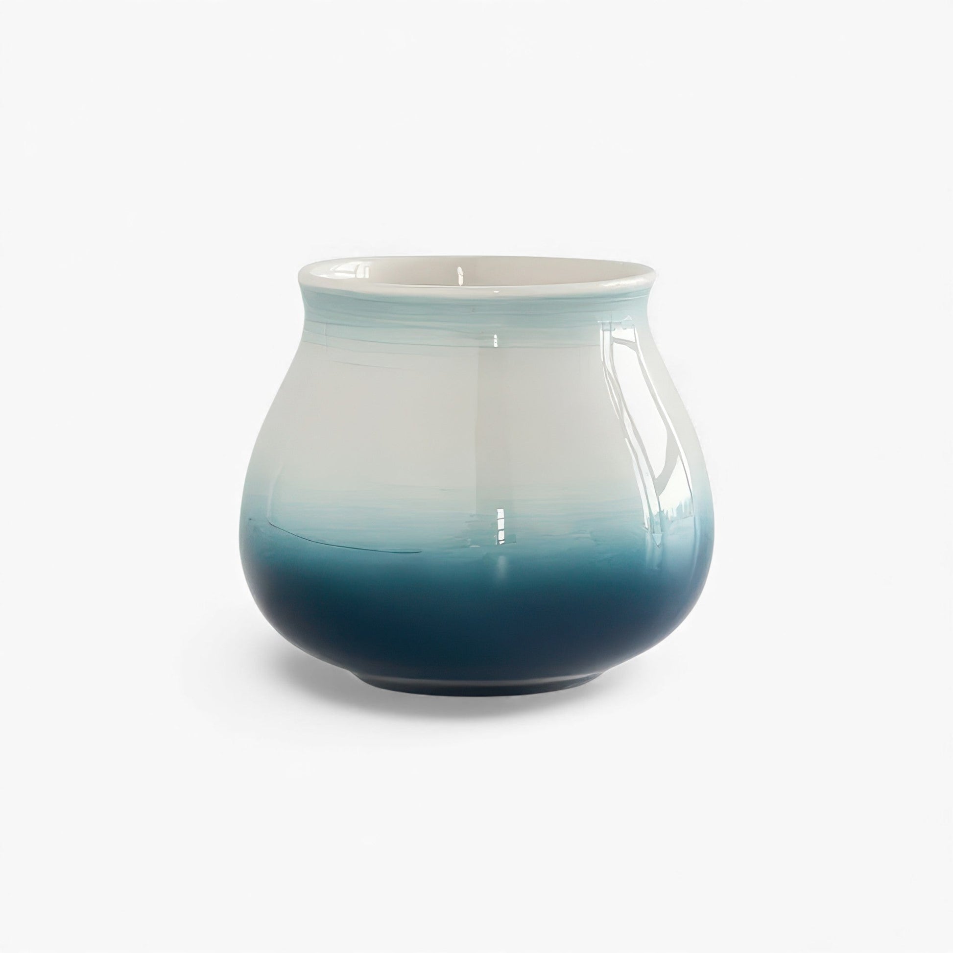 Ceramic gradient coffee cup with blue-to-navy ombre, wide mouth and hemispherical bottom, 180ml.