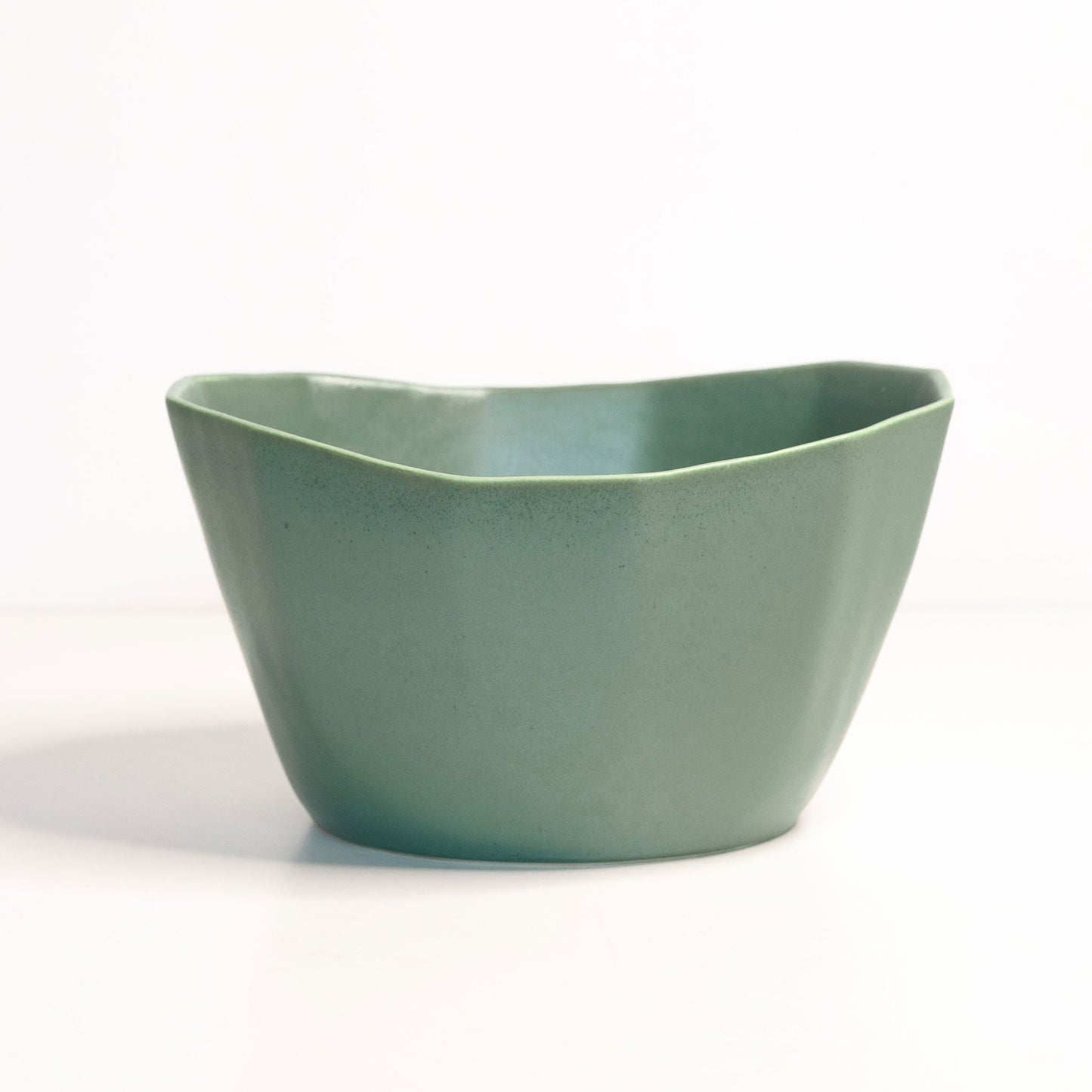 Medium porcelain nesting bowl in sage teal glaze, Ember Collective; ideal for snacks, ice cream or soup.