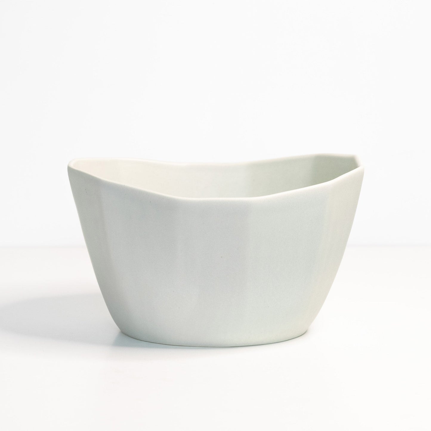 Ember Collective’s Medium Porcelain Nesting Bowl, handmade porcelain, perfect for snacks, ice cream, or soup.