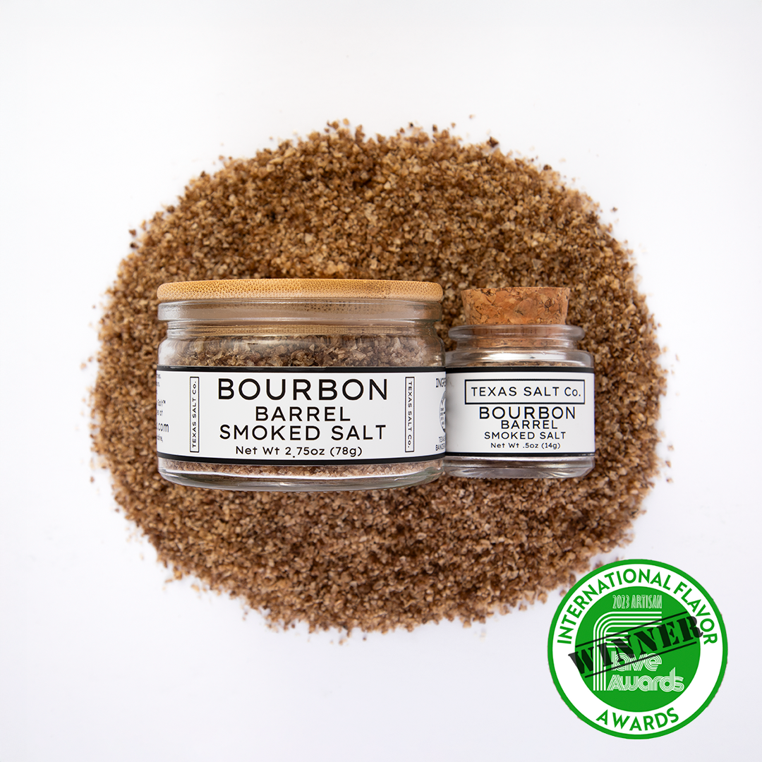 Bourbon Barrel Smoked Salt: two jars atop a salt mound, 1st place winner at 2023 International Flavor Awards.