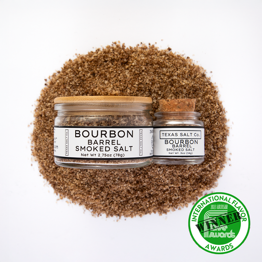 Bourbon Barrel Smoked Salt: two jars atop a salt mound, 1st place winner at 2023 International Flavor Awards.