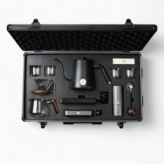 Ultimate Pour Over Coffee Pro Kit in a foam-lined case with kettle, carafe, drippers, and accessories.