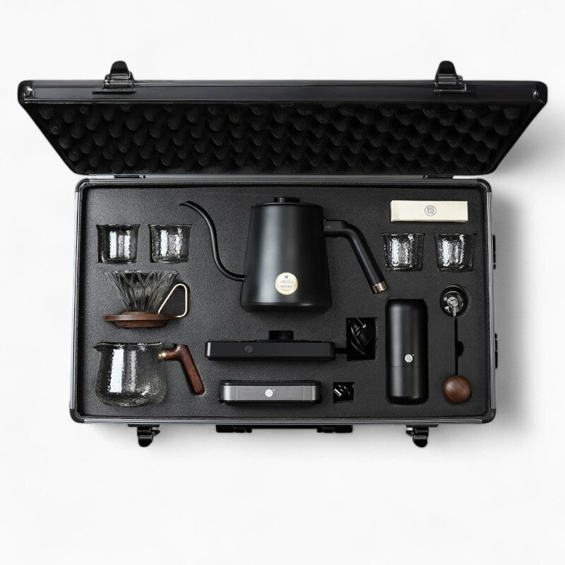 Ultimate Pour Over Coffee Pro Kit in a hard case with gooseneck kettle, carafe, scales, and glass tumblers.